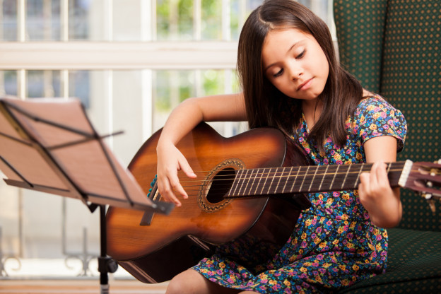 Image result for child playing guitar